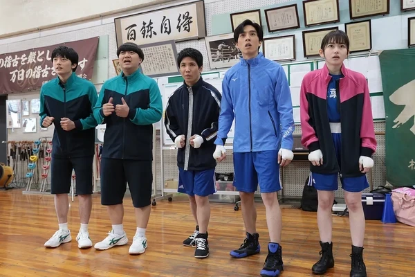 Group of young characters from "To The Future 10 Count" stand in a boxing - training room.
